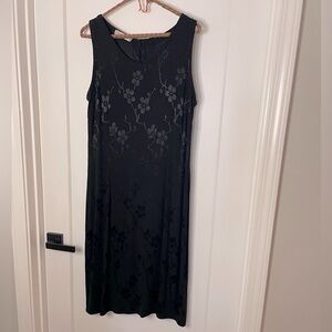 Elegant black dress with black embroidered flowers